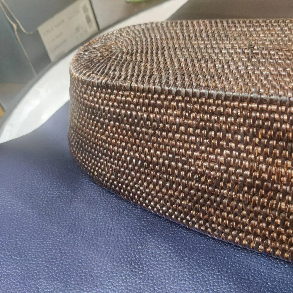 Woven bread basket is long and rectangular oval shape. The weave is exceptional